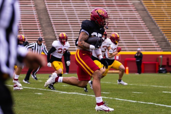 Dylan Lee runs the ball during the Spring Game at Jack Trice Stadium on April 20, 2024.
