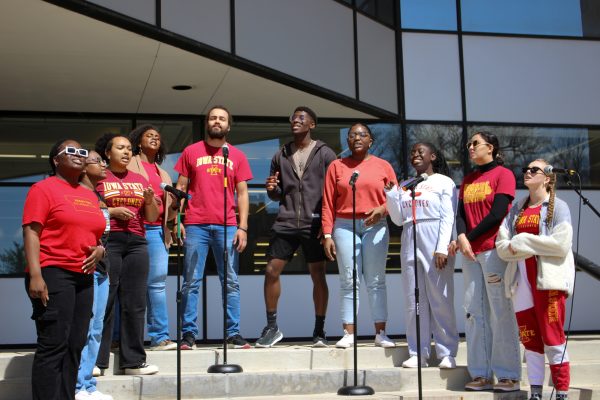 Iowa States Jubilee Gospel Choir serenades students and guest on the Park Library stairs. Iowa State University Park Library Front Lawn, 