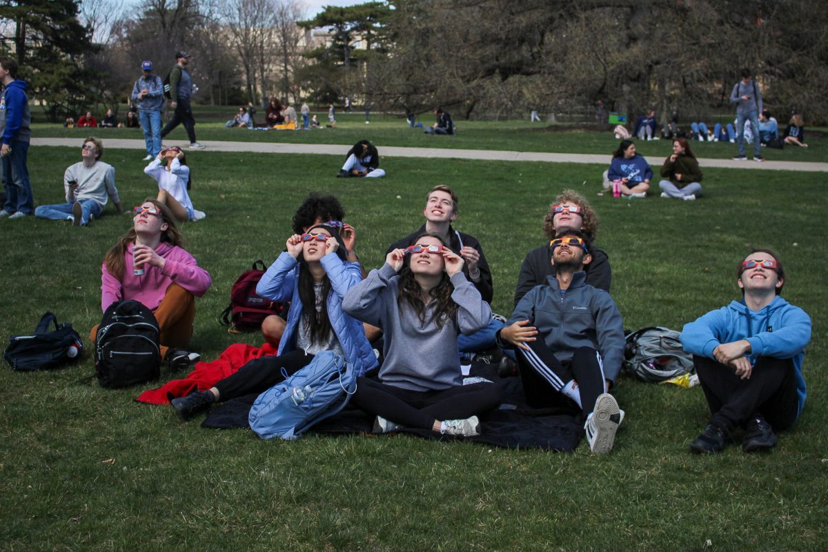 Large group of Iowa State Students watch the eclipse together. Iowa State University Central Campus, April 8th 2024.