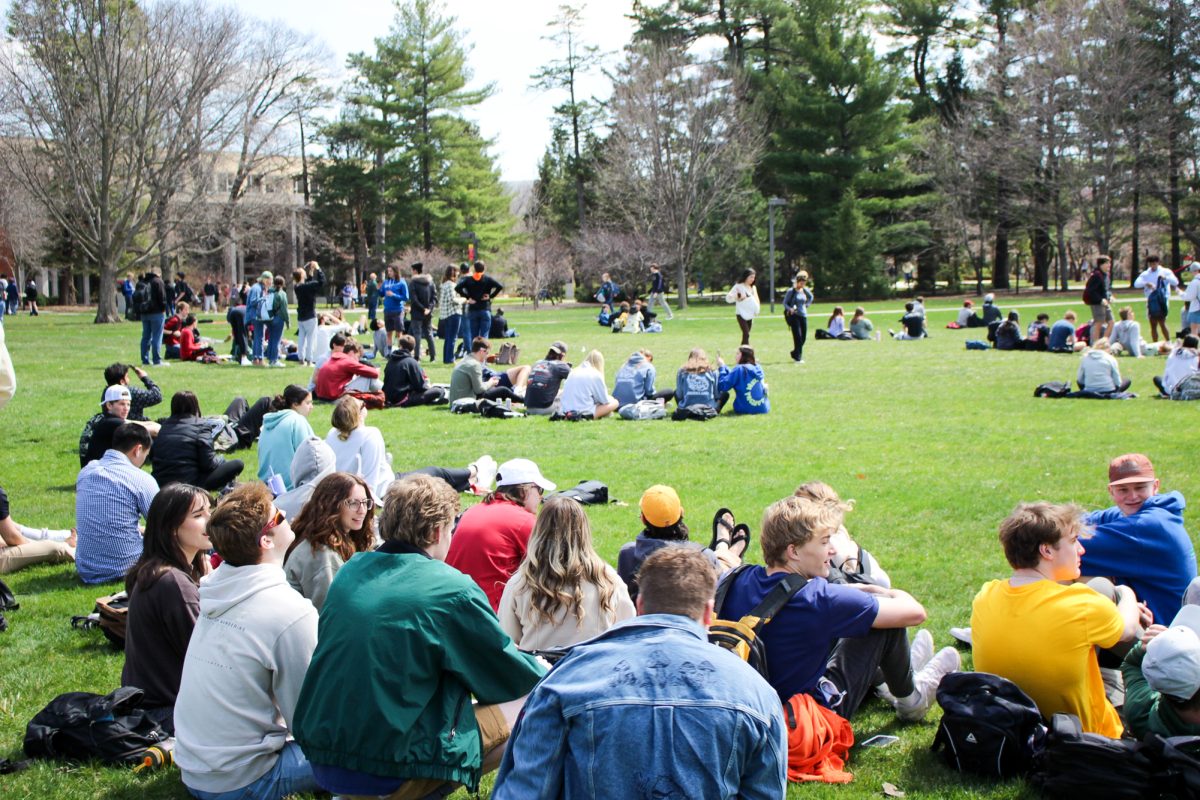 Iowa State students gather in groups by the dozen to watch the eclipse. Iowa State University Central Campus, April 8th 2024.