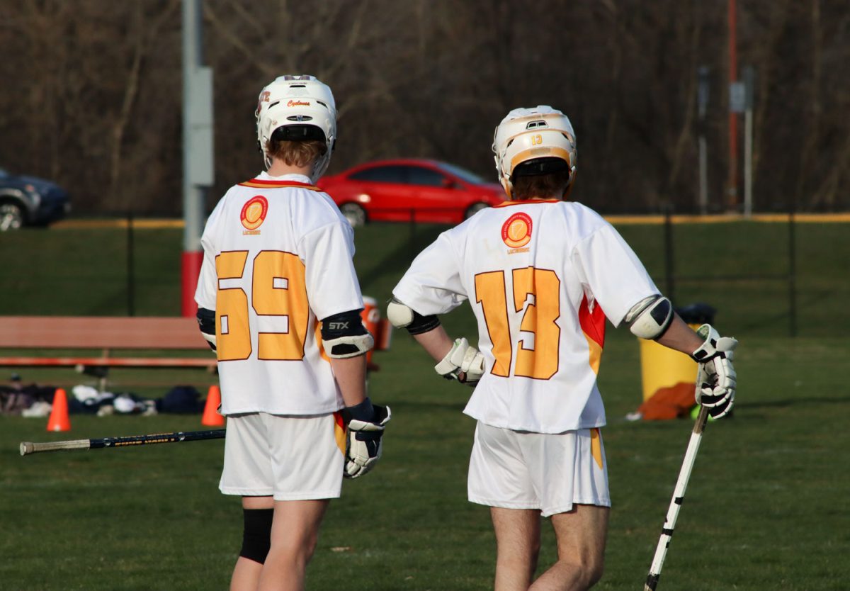 Thomas Berg and Max Carlson stand together before the lacrosse game starts at the Iowa State vs. Illinois lacrosse game, April 5, 2024, at the Lied Recreation Center. 