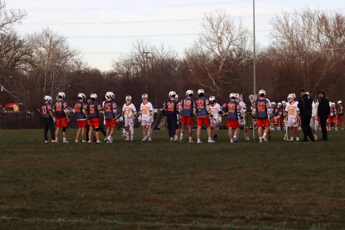 Iowa State and Illinois lacrosse starters line up to listen to the referees before the game starts at the Iowa State vs. Illinois lacrosse game, April 5, 2024, at the Lied Recreation Center. 