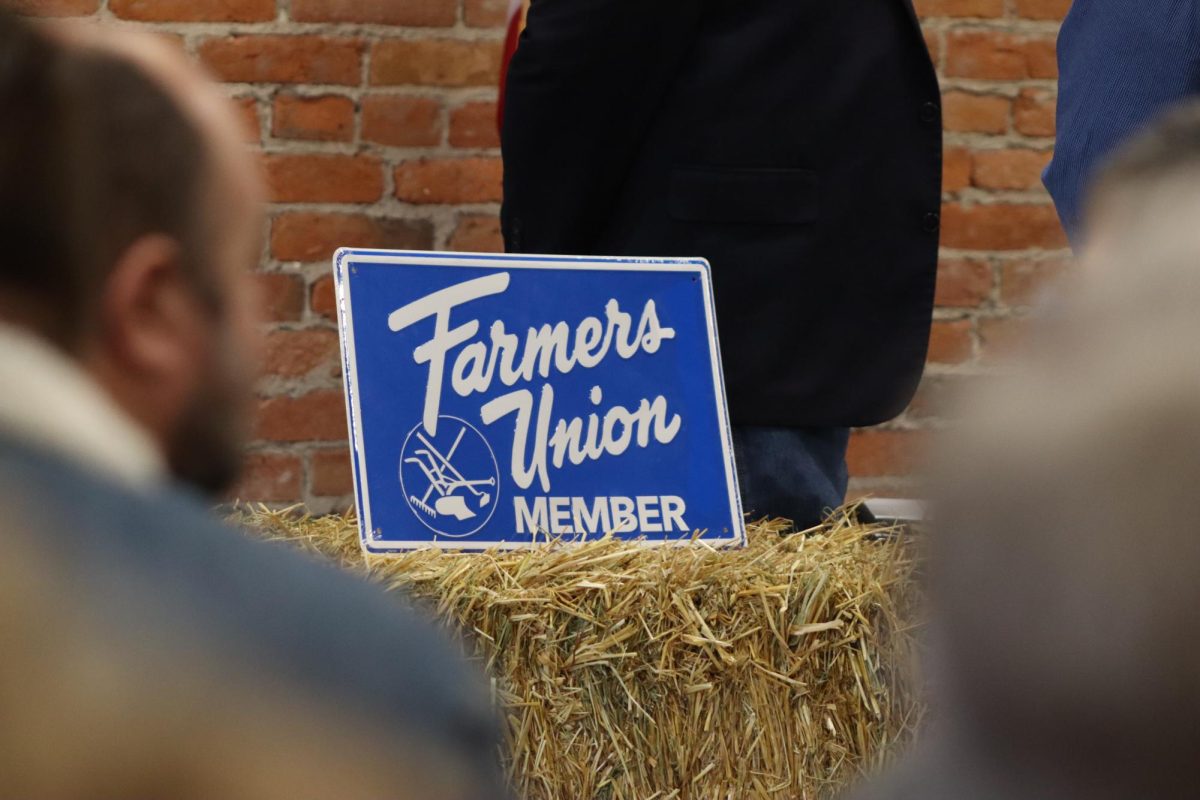 Farmers Union member sign being displayed at the FTC chair event in Nevada, Iowa, on April 20, 2024.