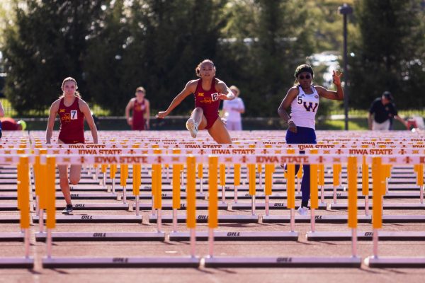 Kailynn Gubbels (left), Kiersten Fisher (middle) and Sophia Myers (right) compete in the 100m hurdles during the ISU Alumni Open at Cyclone Sports Complex on May 3, 2024.