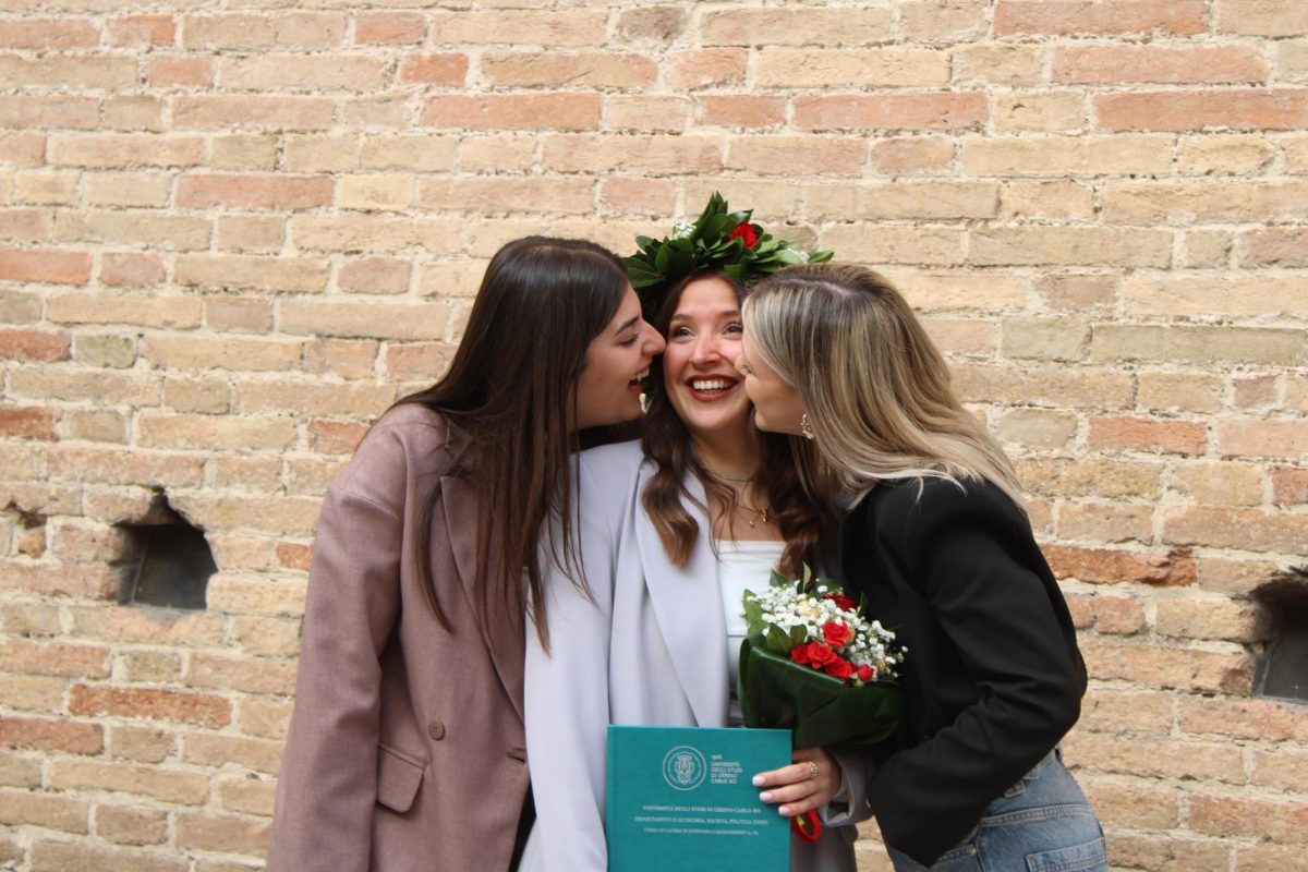 Agnese Garbugli with two best friends Chiara Camillini (left) and Gloria Rossi (right). Rossi, along her Garbugli’s brother Alessandro, planned all of the jokes to embarrass her including the costume, karaoke and the bartender act. 