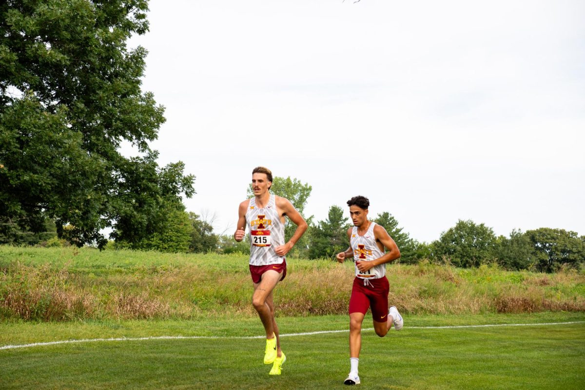 Devan Kipyego and Ryan Watts fight for first after the second lap at the Cyclone Preview Cross Country meet, Iowa State University Cross Country Course, Aug. 30, 2024.