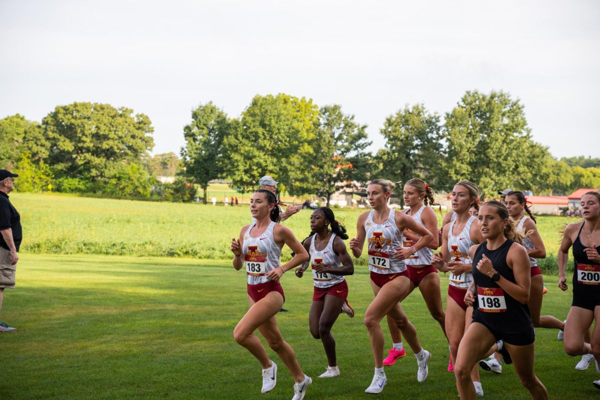 Maelle Porcher leads the Iowa State women after the first lap at the Cyclone Preview Cross Country meet, Iowa State University Cross Country Course, Aug. 30, 2024.