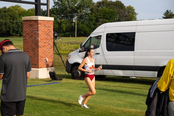 Maelle Porcher finishes first at the Cyclone Preview Cross Country meet, Iowa State University Cross Country Course, Aug. 30, 2024.