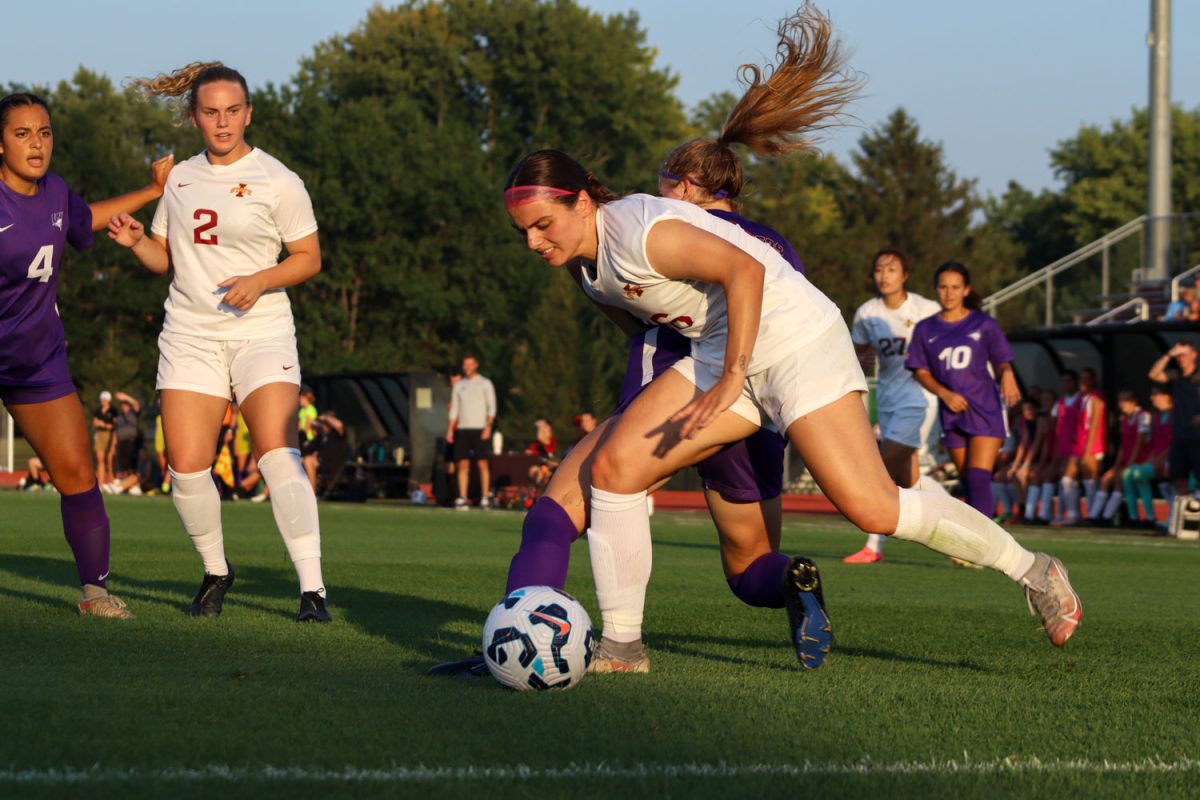 Magdalena Keck goes for the ball as she gets fouled by a Panther at the Iowa State vs. University of Northern Iowa match, Cyclones Sports Complex, Aug. 25, 2024. 