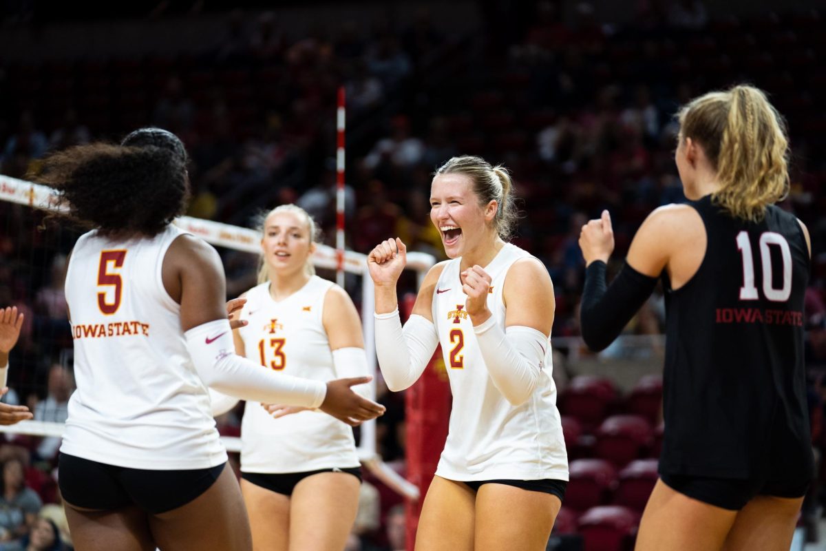 Morgan Brandt (2) celebrates with Maya Duckworth (5) during the Iowa State vs. Illinois match, Hilton Coliseum, Sept. 7, 2024.