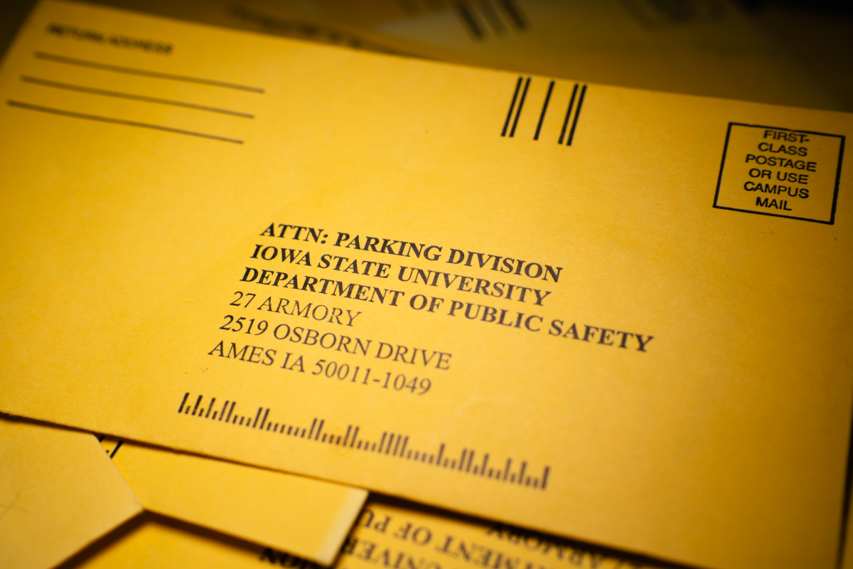 Yellow parking ticket folders distributed by the parking division of the Iowa State University Department of Public Safety. Sep. 9, 2024.