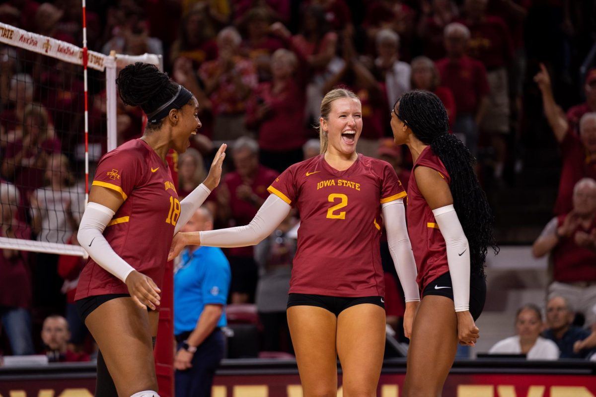 Iowa State joking around after winning a set during the Iowa State vs. Iowa match, Hilton Coliseum, Sept. 11, 2024.