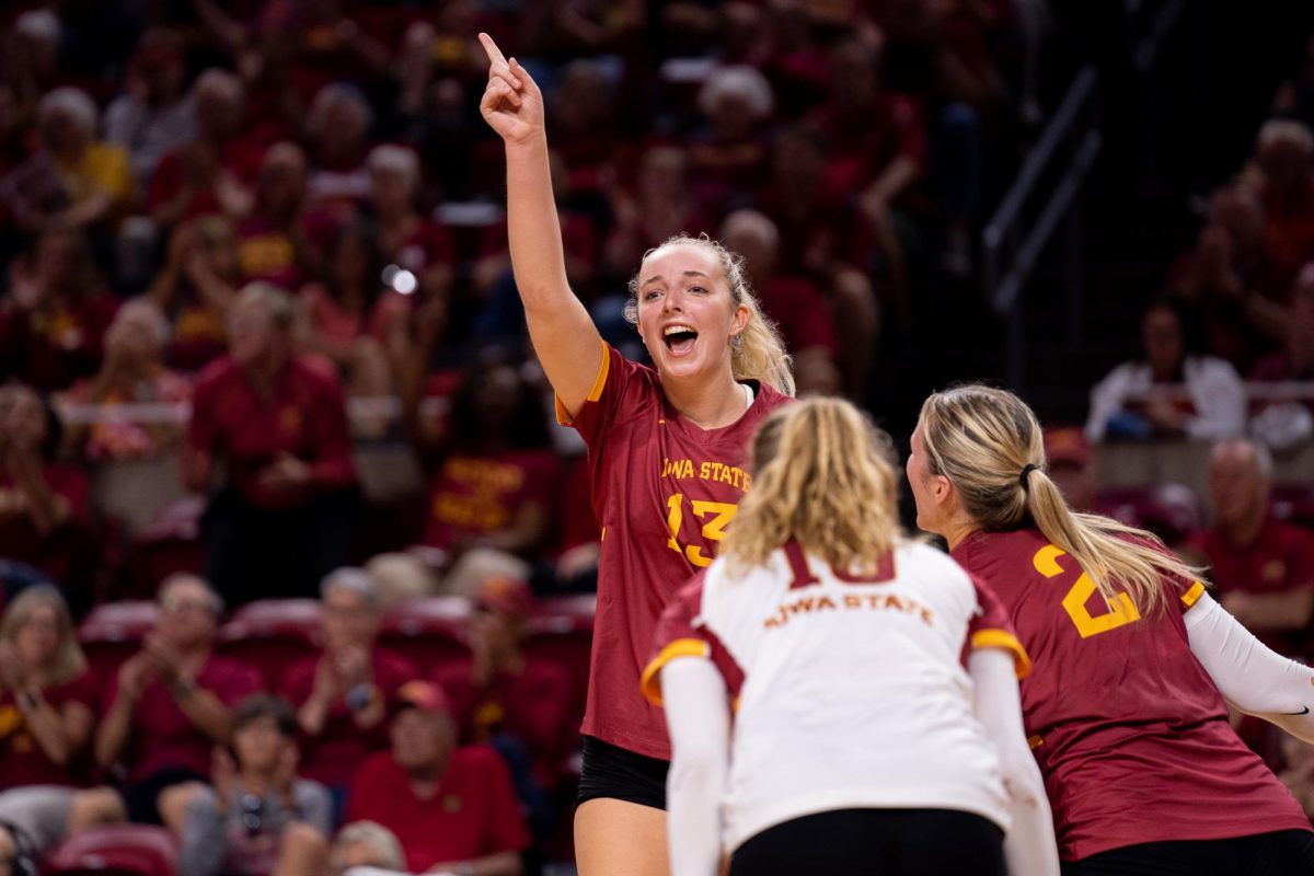 Lilly Wachholz celebrating after blocking a spike during the Iowa State vs. Iowa match, Hilton Coliseum, Sept. 11, 2024.