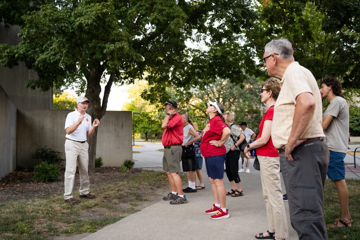 ISU Horticulture professor Jeff Iles discusses campus plant life in front of Ross Hall during the Trees and Sculpture on Central Campus tour, Sept. 17, 2024.