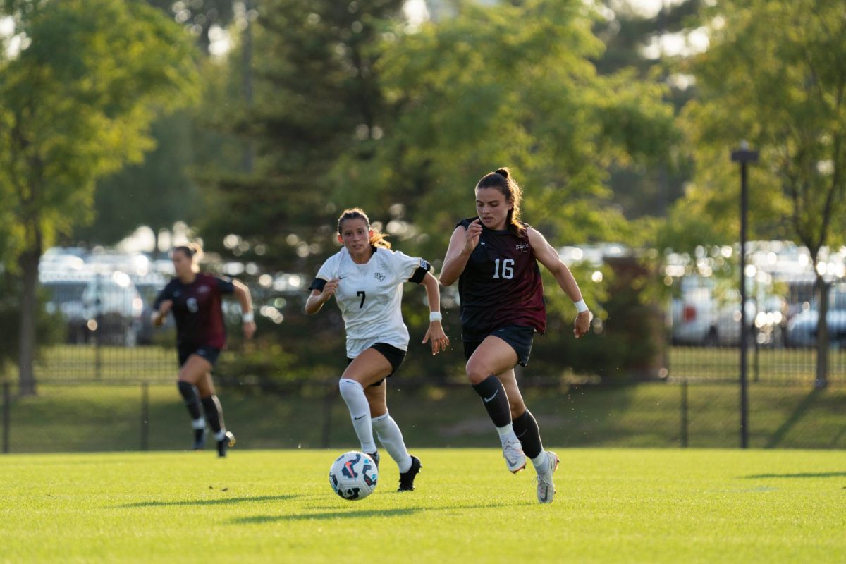 Magdalena Keck (16) dribbling past UCF's defenders during the Iowa State vs. UCF match, Cyclone Sports Complex, Sept. 19, 2024.