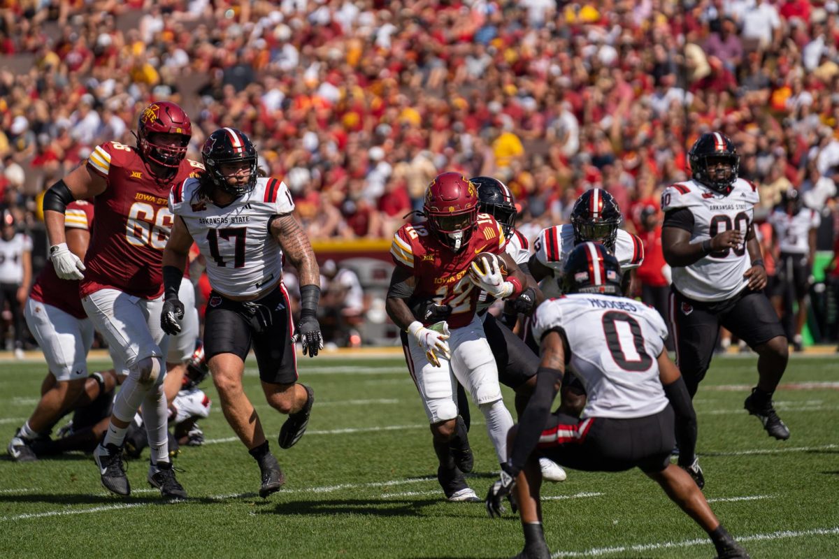 Jaylon Jackson (12) rushing for a first down during the Iowa State vs. Arkansas State match, Jack Trice Stadium, Sept. 21, 2024.