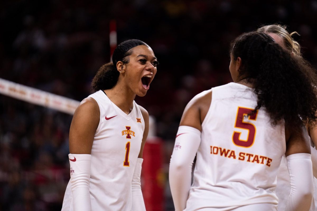 Pam McCune celebrating after putting a point on the board during the Iowa State vs West Virginia match, Hilton Coliseum, Sept. 28, 2024.