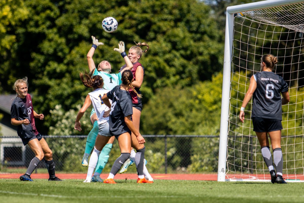 Avery Gillahan (1) jumps up to deflect the ball during the match vs. Northern Colorado at Cyclones Sports Complex  on Sept. 8, 2024.