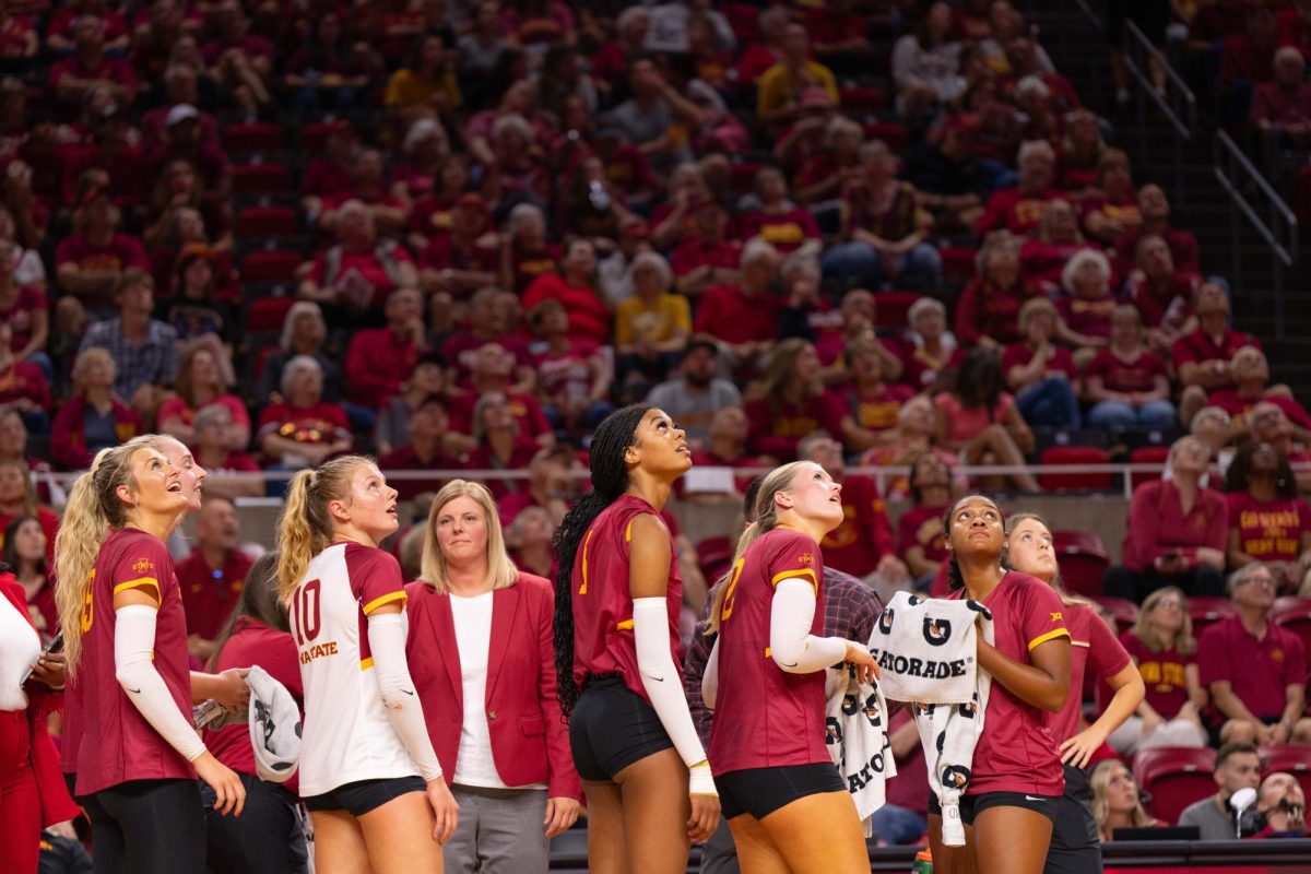 Iowa State watches the screen during an Iowa State challenge at the Iowa Corn Cy-Hawk series volleyball meet against the University of Iowa, Hilton Coliseum, Sept. 11, 2024.