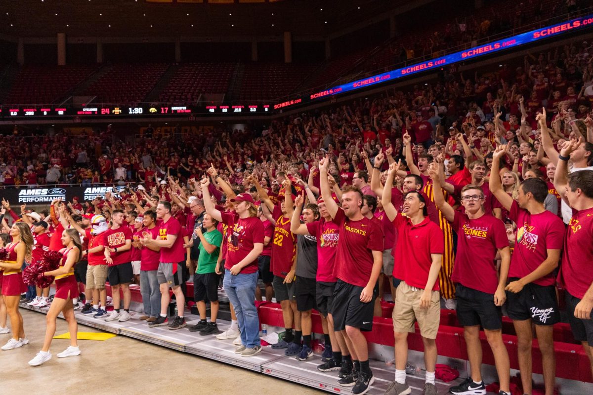 Iowa State student section watches on for the final match point during the Iowa Corn Cy-Hawk series volleyball meet against the University of Iowa, Hilton Coliseum, Sept. 11, 2024.