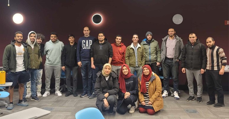 Students pose for a photo at the end of semester ESA meeting during fall 2023.