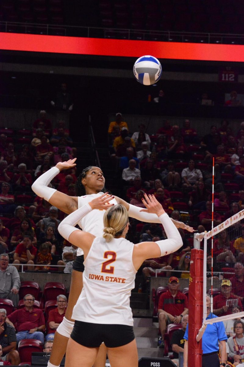 Amiree Hendricks-Walker (18) spikes the ball during the Iowa State vs. West Virginia game, Hilton Coliseum, Ames, Iowa, Sept. 28, 2024.