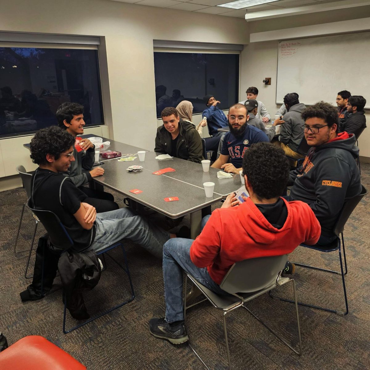 Students enjoy a card game at an MSA meeting last semester.