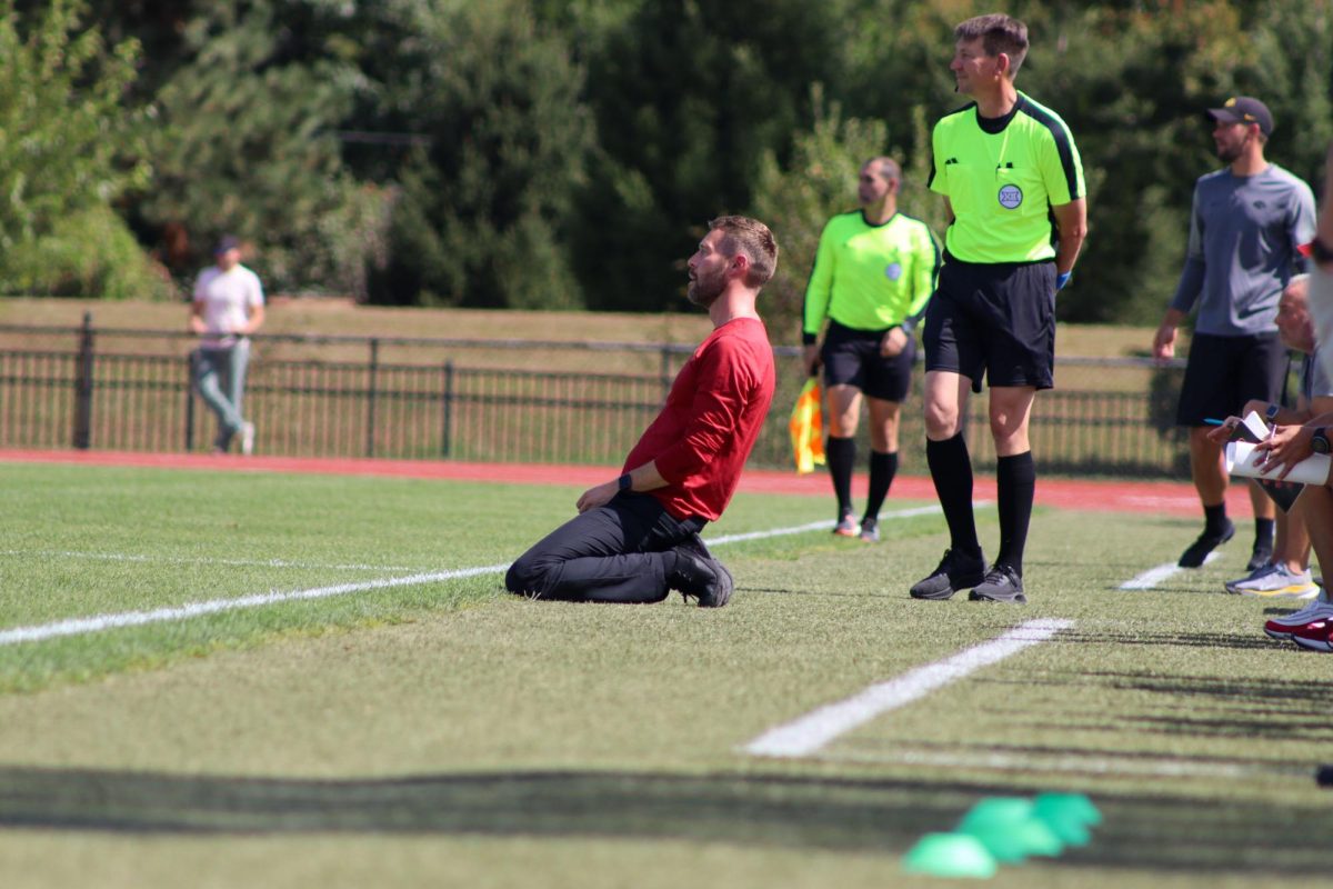 Head coach Matt Fannon falls to his knees after a play is made at the Iowa State vs Iowa soccer match on Sept. 15, 2024 at the Cyclones Sports Complex.  