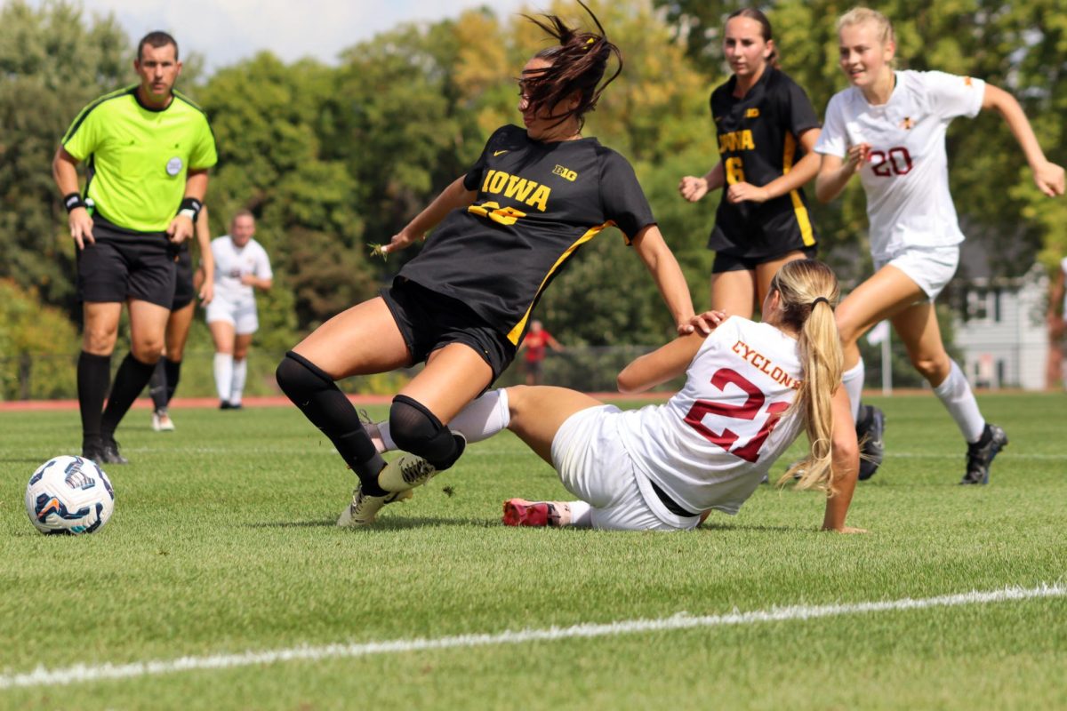 Ella Ciardullo (21) gets fouled by a University of Iowa player at the Iowa State vs. University of Iowa soccer match on Sep. 15, 2024 at the Cyclones Sports Complex.  