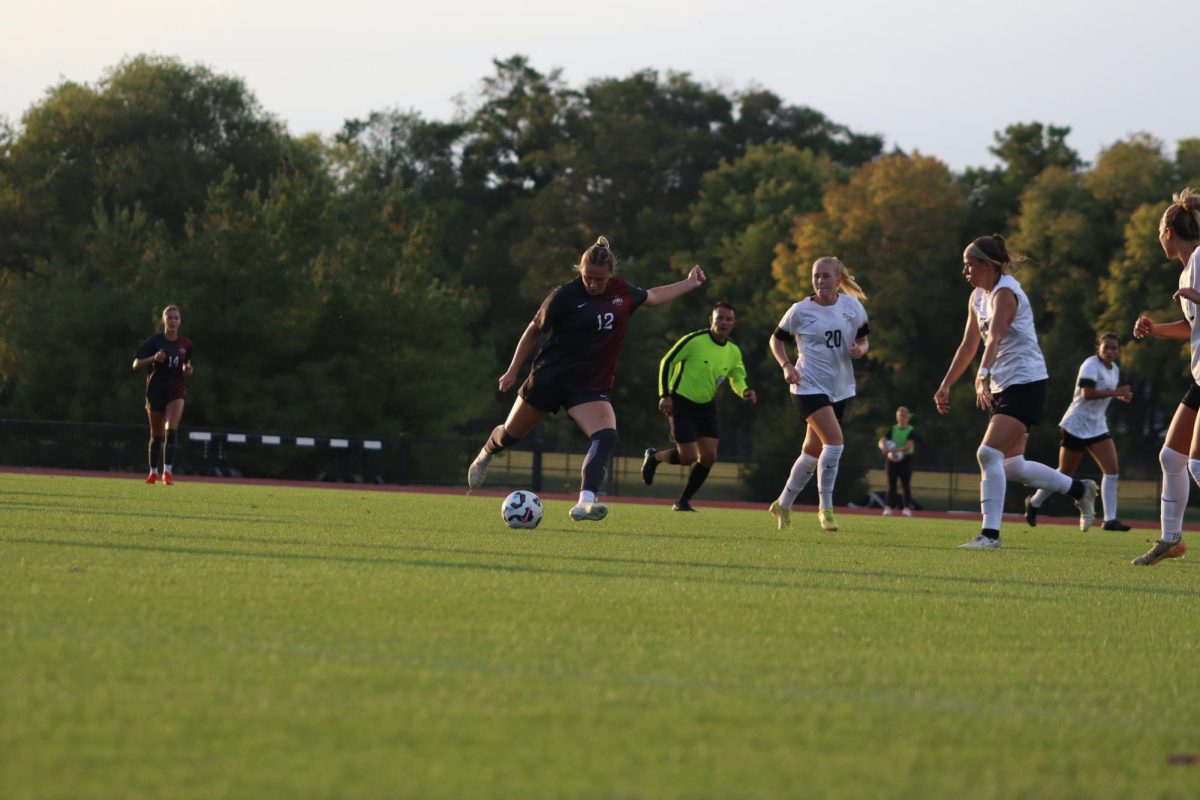 Morgan Furmaniak (12) kicks the ball down the field at the Iowa State vs. University of Central Florida match, Cyclone Sports Complex, Sep. 19, 2024.