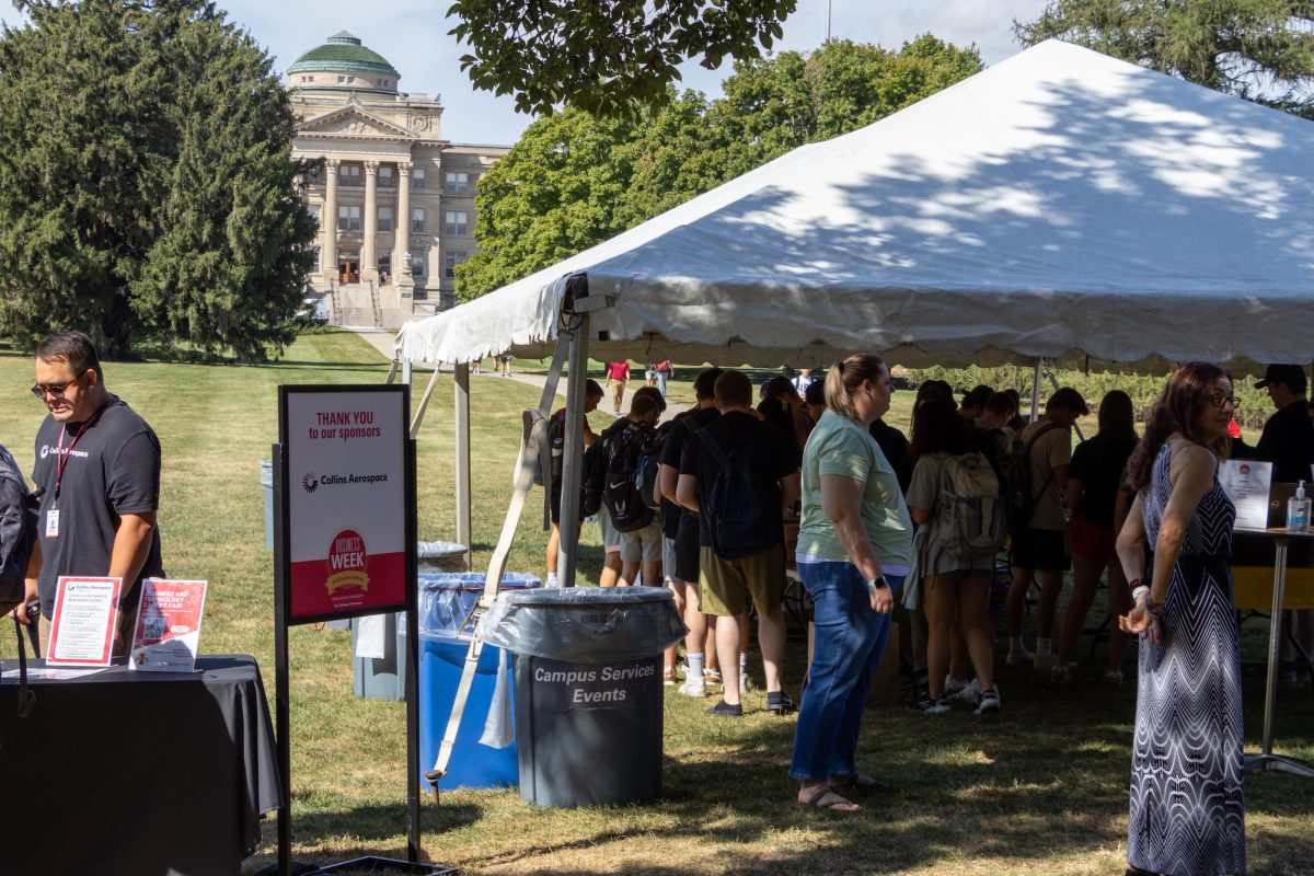 Students gather in central campus for a free lunch and to talk to Collins Aerospace, Ames, Iowa, Sept. 16, 2024.