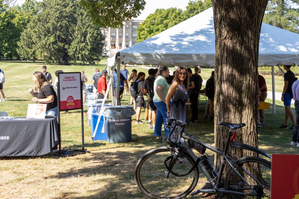 Students gather in central campus for a free lunch and to talk to Collins Aerospace, Ames, Iowa, Sept. 16, 2024.