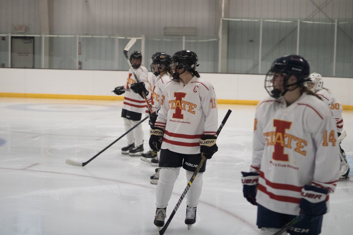 Iowa State's women's hockey club team getting ready to start final period versus the University of Iowa women's hockey club at the ISU Ice Arena, Sept. 27, 2024.