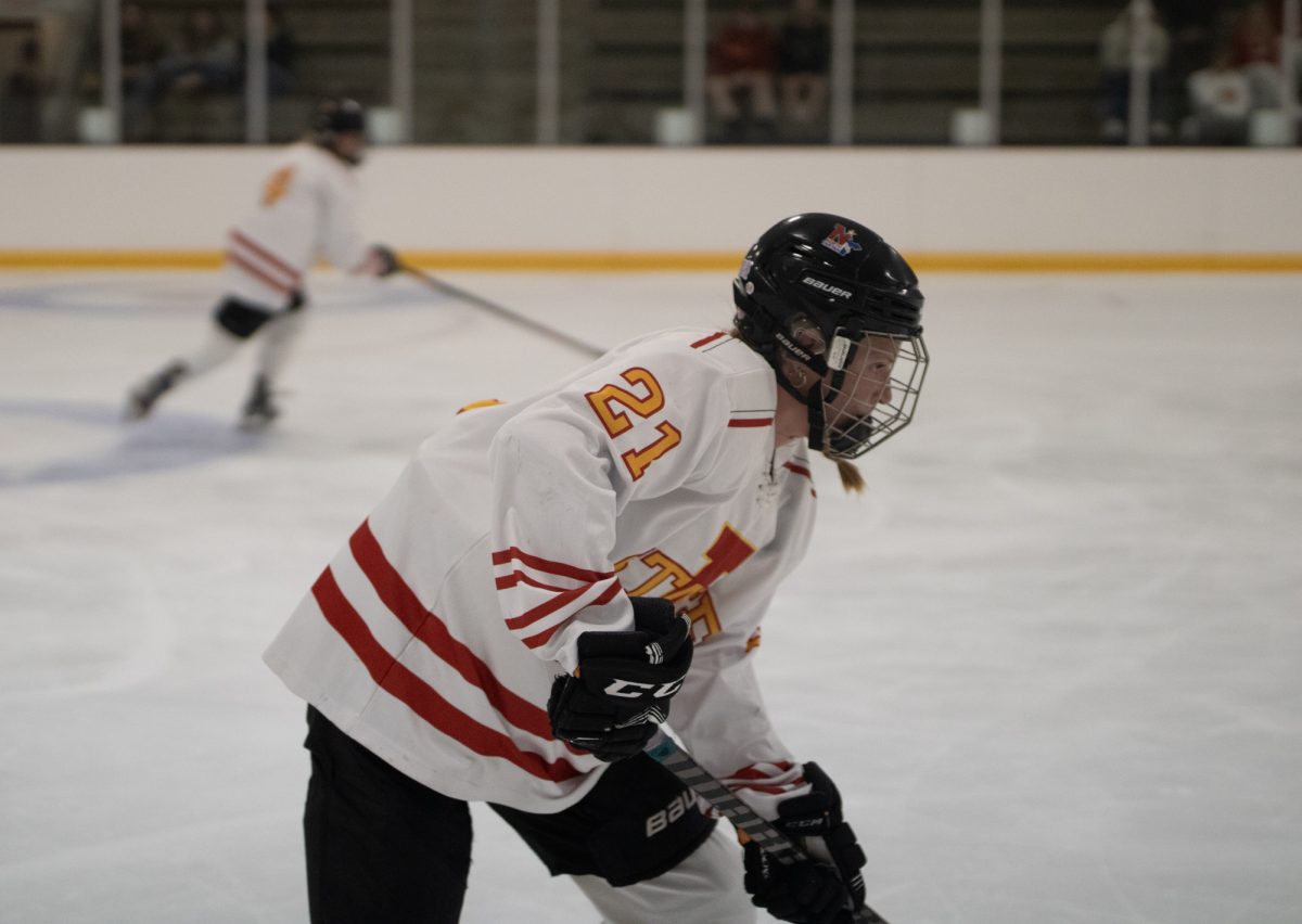 Iowa State's women hockey club player number 21 warming up before home opener versus the University of Iowa women's hockey club at the ISU Ice Arena, Sept. 27, 2024.