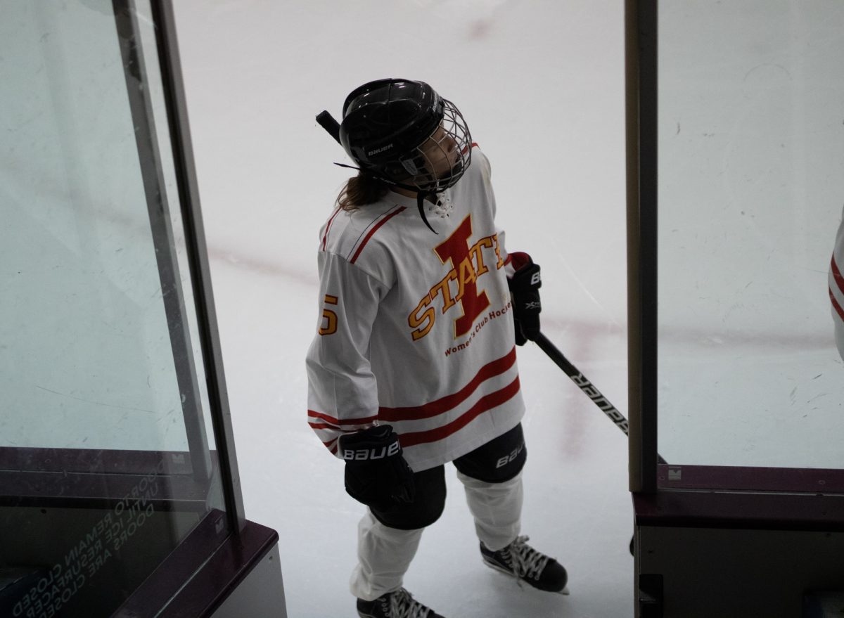 Iowa State women's hockey club player number 5 looking out onto the ice after home opener win versus the University of Iowa women's hockey club at the ISU Ice Arena, Sept. 27, 2024.