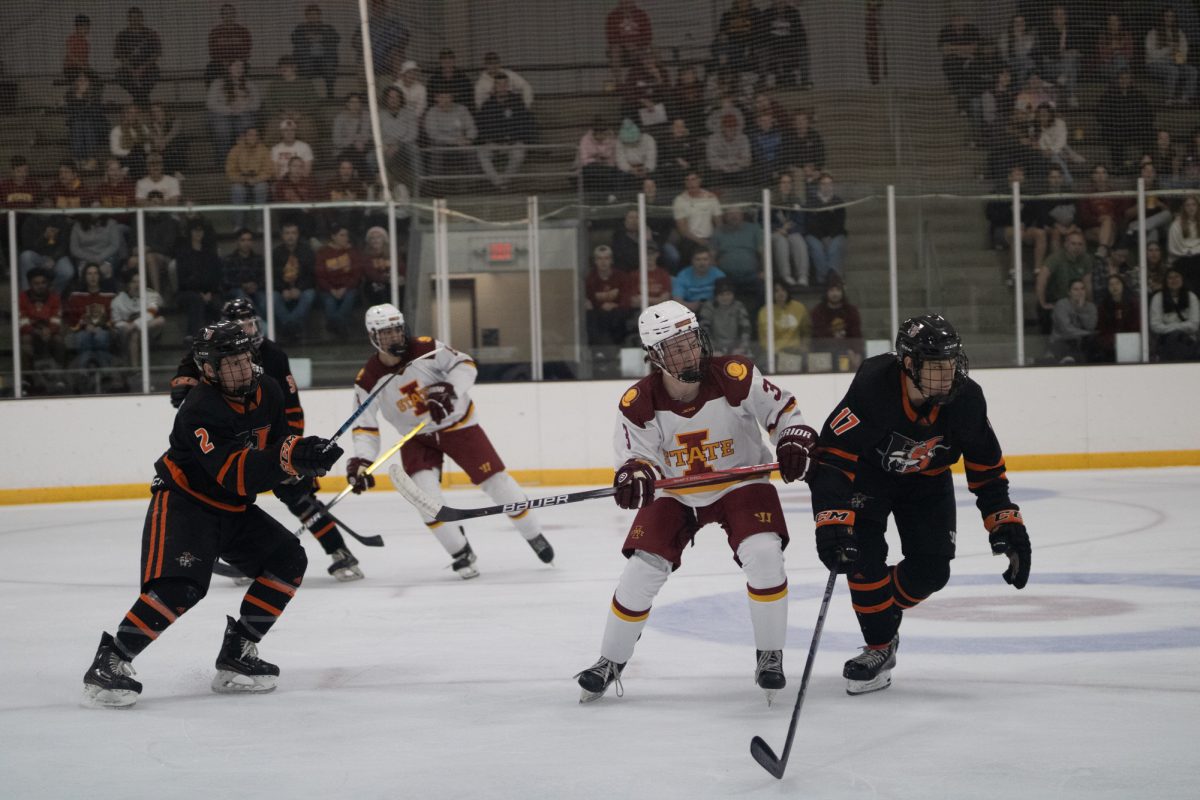 Iowa State's men's hockey club player number 3 racing to get the puck versus University of Jamestown men's hockey team at the ISU Ice Arena, Sept. 27, 2024. 