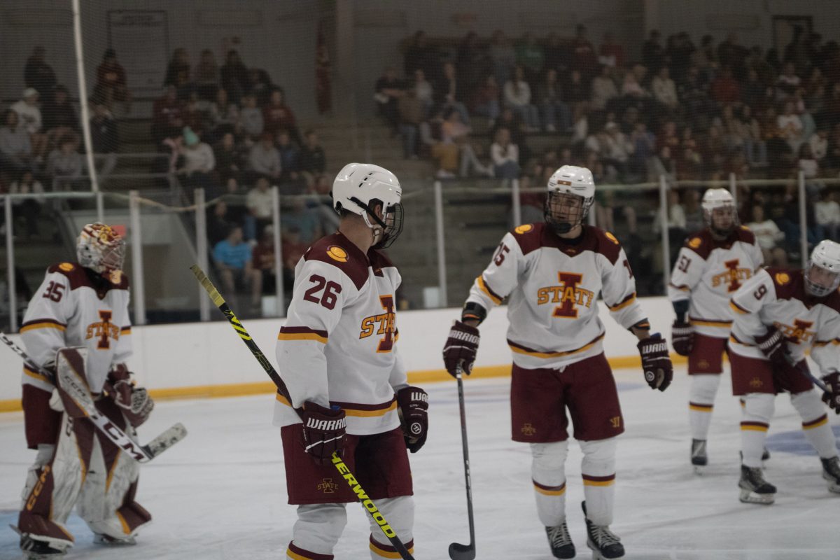 Iowa State's hockey club players Dj Girardi (51), Trevor Slaght (9), Jacob Schuldt (15), Ethan Ranger (26), and Harrison Moen (35) getting ready for the face off versus University of Jamestown men's hockey team at the ISU Ice Arena, Sept. 27, 2024. 