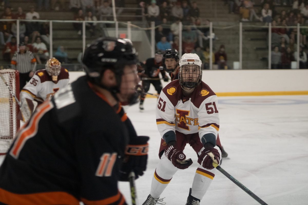 Iowa State's men's hockey club player Dj Girardi playing defense versus University of Jamestown men's hockey team at the ISU Ice Arena, Sept. 27, 2024. 