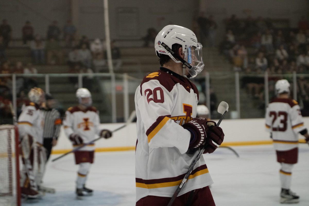 Iowa State's men's hockey club player Ben Pfannenstein (20) getting ready for a face off versus University of Jamestown men's hockey team at the ISU Ice Arena, Sept. 27, 2024. 