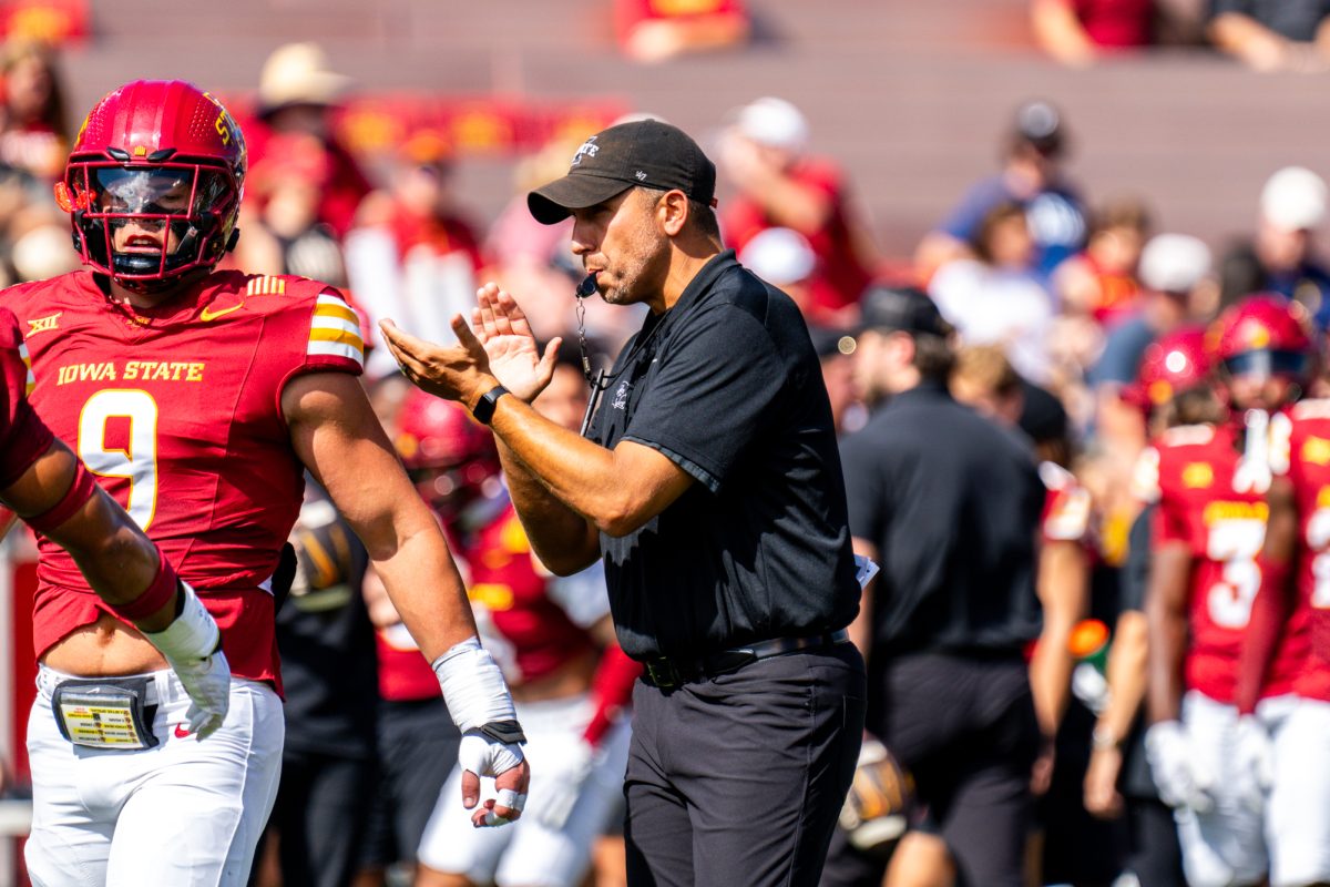 Head Football Coach Matt Campbell calls for his team during warmups before the Iowa State football game vs Arkansas State at Jack Trice Stadium on Sept. 21, 2024.