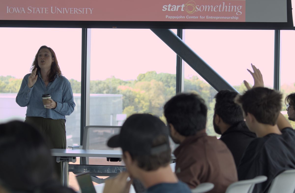 Eric Franczyk raises his hand as Megan Graettinger finishes answering a question during the Fall Pitch Workshop, Student Innovation Center, Sept. 23, 2024.