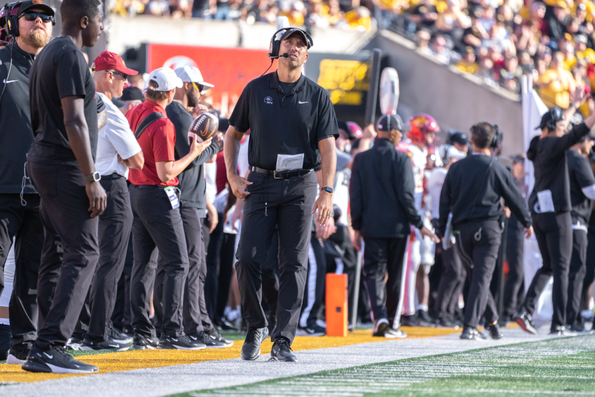 Matt Campbell walks down the sideline during the Cy-Hawk game against Iowa at Kinnick Stadium in Iowa City, Iowa on Sept. 7 2024.