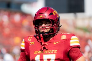 Beau Freyler (17) goes through team stretches before the game against Arkansas State at Jack Trice Stadium on Sept. 21, 2024.