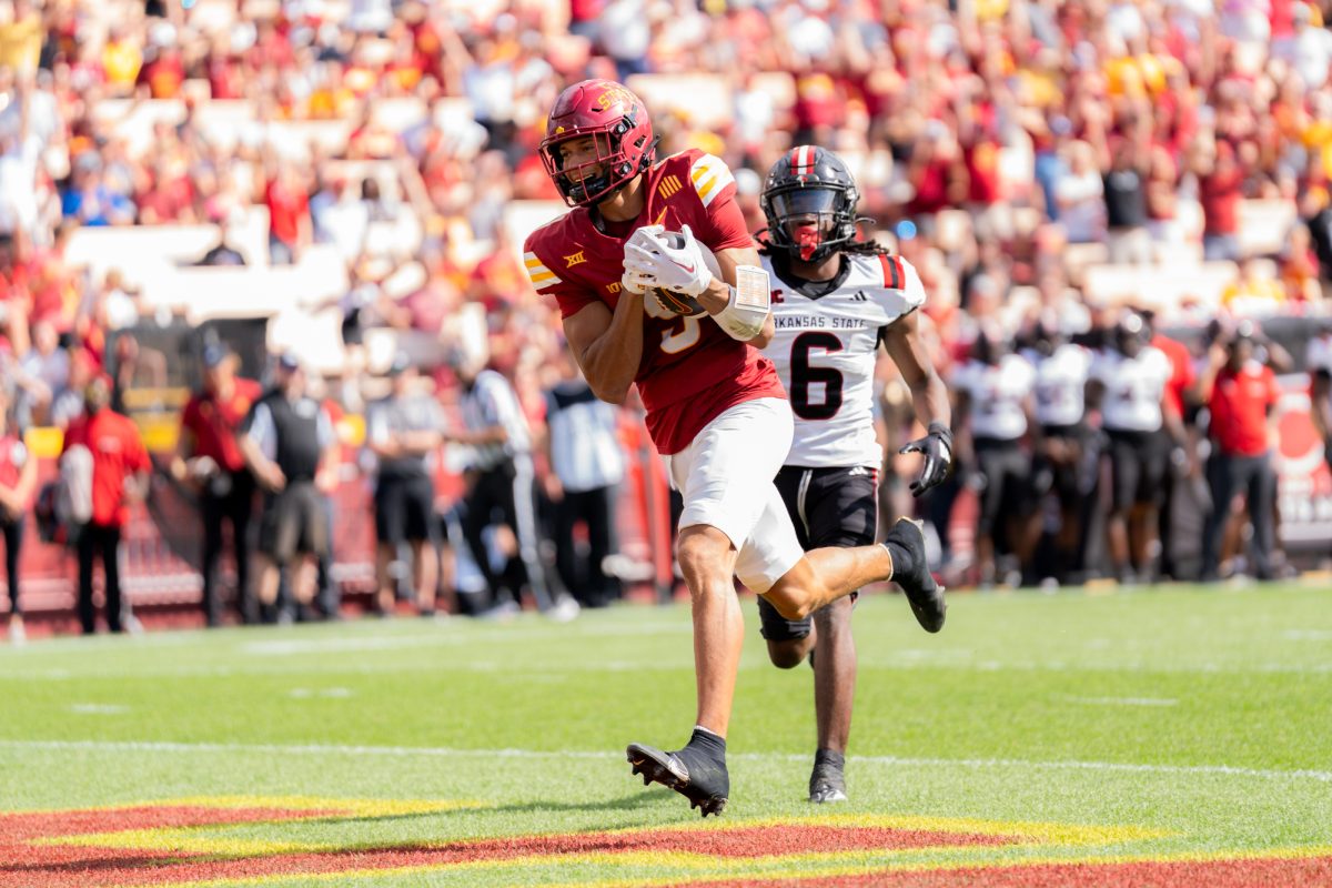 Jayden Higgins (9) scores a touchdown against Arkansas State at Jack Trice Stadium on Sept. 21, 2024.