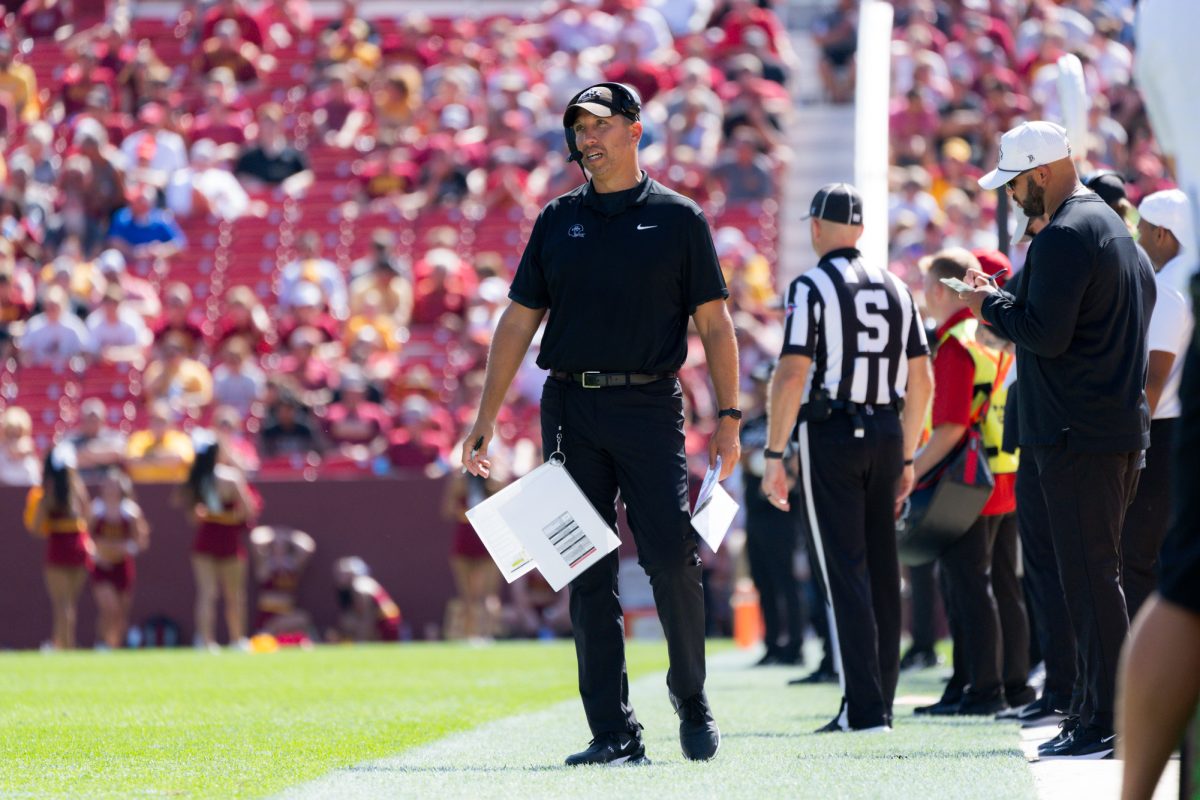 Matt Campbell coaching on the sideline against Arkansas State at Jack Trice Stadium on Sept. 21, 2024.