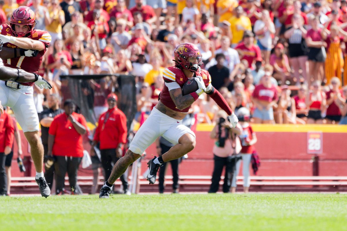 Malik Verdon (7) runs the ball after an interception against Arkansas State at Jack Trice Stadium on Sept. 21, 2024.