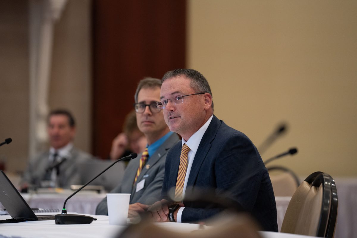 Matt Darr, a professor of agricultural and biosystems engineering, gives a presentation titled "Digital Innovation Powers the Future of Iowa Farming," during the Board of Regents meeting at the Alumni Center on Sept. 19, 2024. 