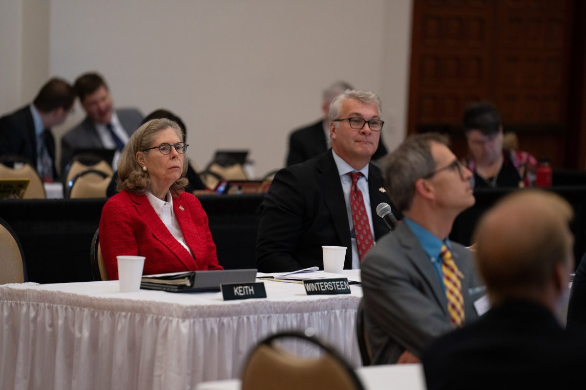 Iowa State President Wendy Wintersteen watches the faculty presentation during an Iowa Board of Regents meeting at the Alumni Center on Sept. 19, 2024. 