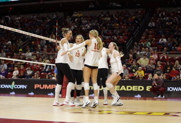 Iowa State celebrates together after they scored a point at the Iowa State vs. Brigham Young University volleyball game at Hilton Coliseum Oct.16, 2024. 