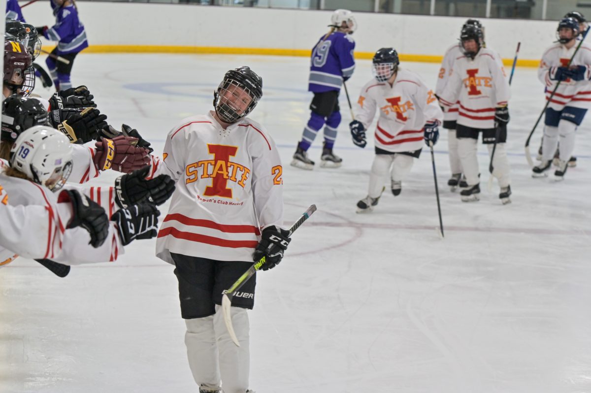 Iowa State Women's Club Hockey player Ellie Volkers (21) scores three goals to perform a hat trick during a game against St. Thomas University at Ames Ice Arena, Oct. 13, 2024.